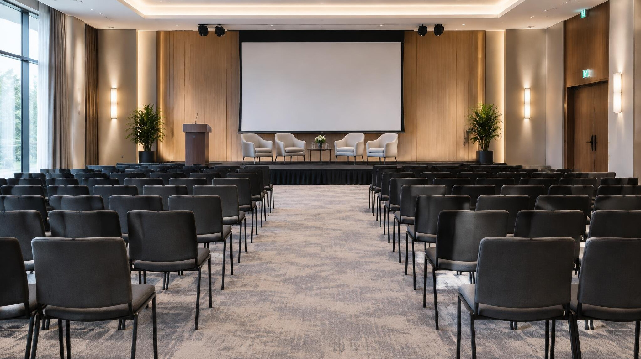 Event conference room with seated audience and stage